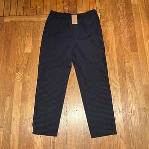 Never been worn A.P.C. Pants men’s size 48. Color is dark blue with pinstripes